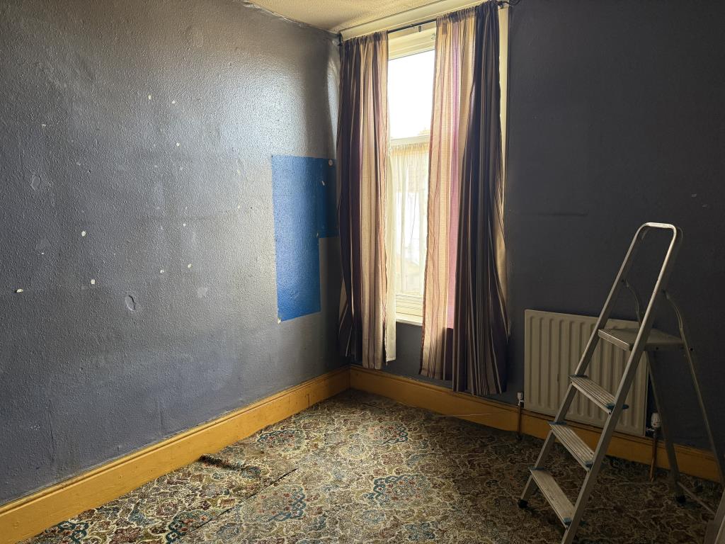 Lot: 133 - THREE-BEDROOM HOUSE IN NEED OF IMPROVEMENT - Bedroom three at rear of property